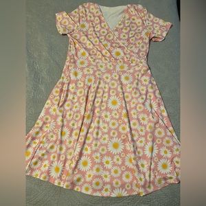 Gently used, plus sized, faux-wrap, fit and flare print dress.